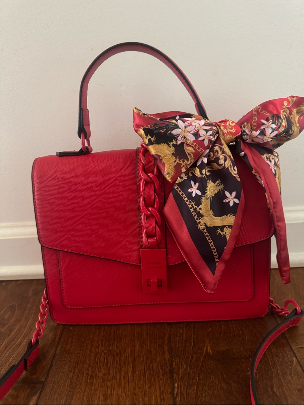 Aldo Red Top-Handle Satchel with Patterned Scarf Accent
 10 1/2 W
8H 
3 1/2 D